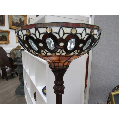 6115 - A Tiffany style leaded glass uplighter on short metal base. 85cm high. Collectors electrical
