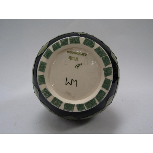 6120 - A Moorcroft Violet pattern vase, 19cm tall