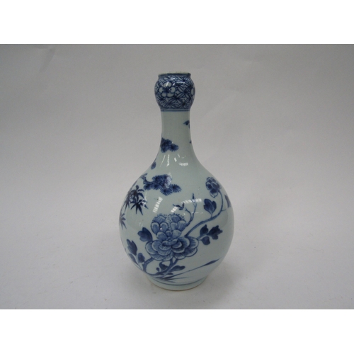 6159 - A 19th Century Chinese blue and white bottle vase, 22cm tall