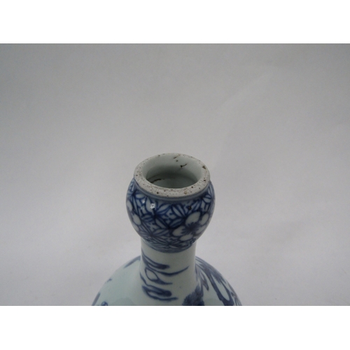 6159 - A 19th Century Chinese blue and white bottle vase, 22cm tall