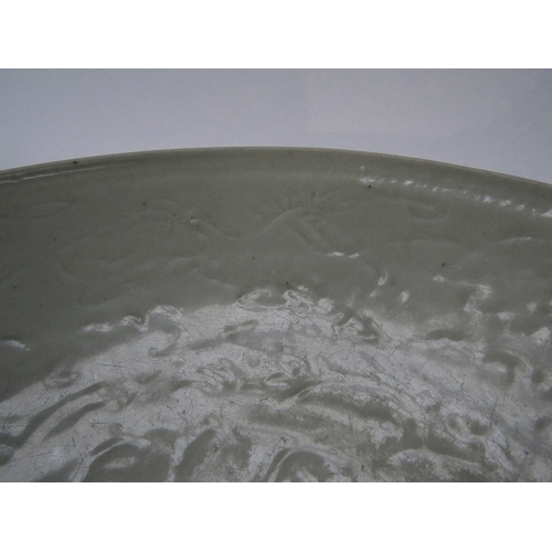 6175 - Ming Dynasty (1368-1644) Chinese celadon bowl with incised leaping horse detail, chips to the rim an... 