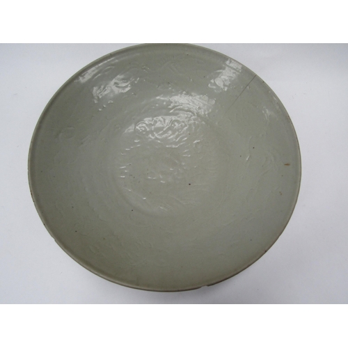 6175 - Ming Dynasty (1368-1644) Chinese celadon bowl with incised leaping horse detail, chips to the rim an... 