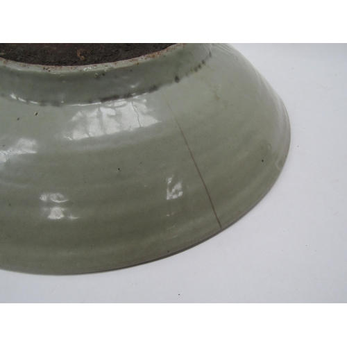 6175 - Ming Dynasty (1368-1644) Chinese celadon bowl with incised leaping horse detail, chips to the rim an... 