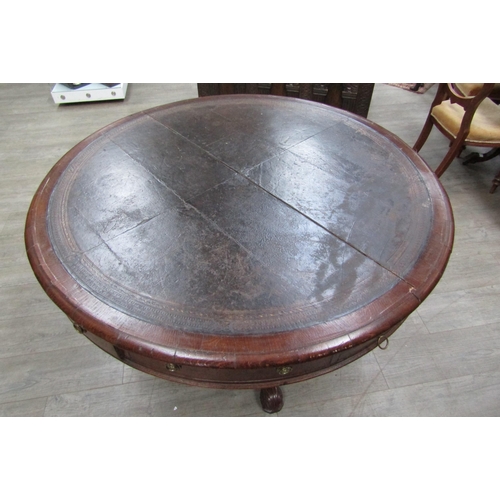 6177A - A Victorian drum/rent table, with original skiver over four frieze drawers and four dummy drawers on... 