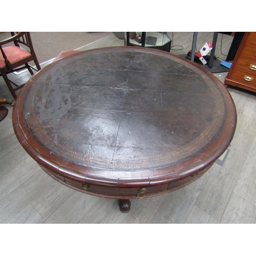 6177A - A Victorian drum/rent table, with original skiver over four frieze drawers and four dummy drawers on... 
