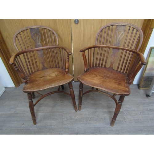 6178 - Two pairs of yew and elm Windsor stick-back solid seat armchairs with crinoline stretchers (4)