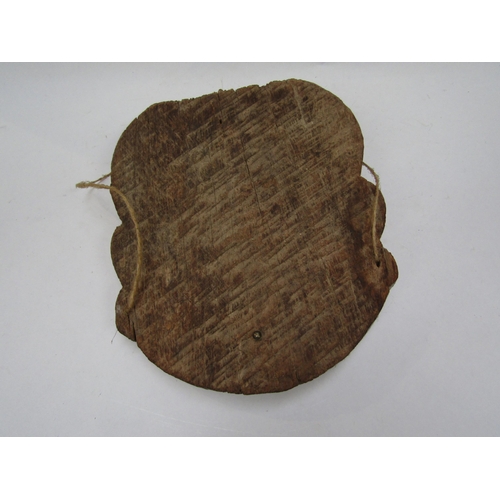 6185 - Two carved masks of two dimensional form, one painted example, 78cm & 29cm tall