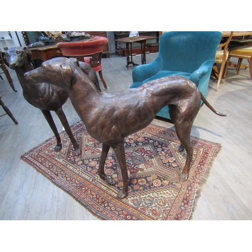 6194 - A pair of large bronze figures of greyhounds, 96cm tall approx 116cm long    (C)