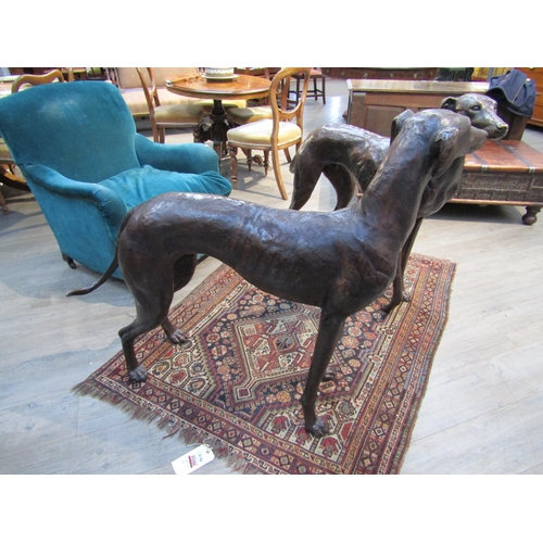 6194 - A pair of large bronze figures of greyhounds, 96cm tall approx 116cm long    (C)