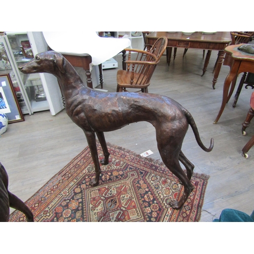 6194 - A pair of large bronze figures of greyhounds, 96cm tall approx 116cm long    (C)