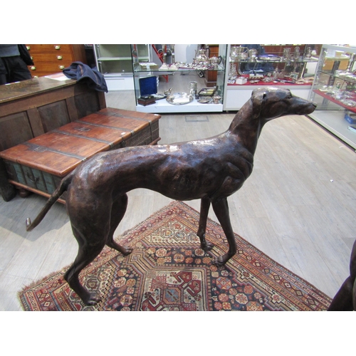 6194 - A pair of large bronze figures of greyhounds, 96cm tall approx 116cm long    (C)