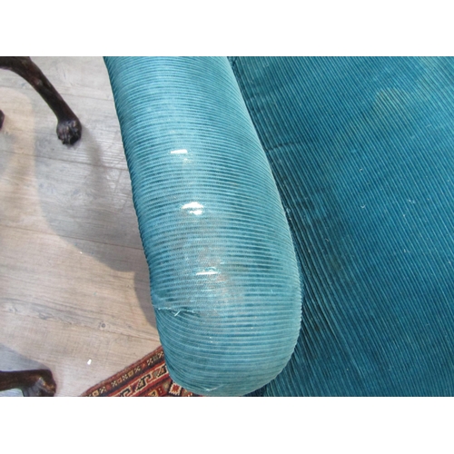 6195 - A Howard and Sons, London Victorian low deep seated armchair on castor feet,  7132/7160 marked on ba... 