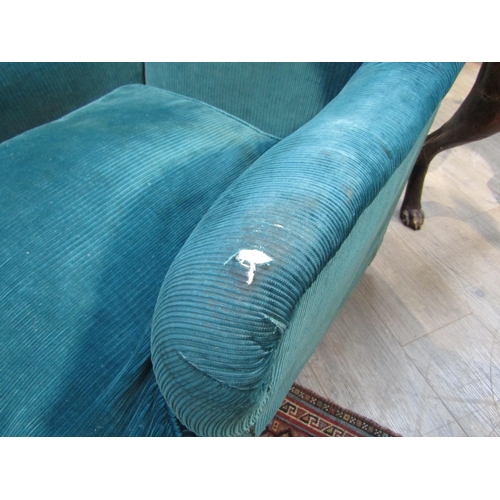 6195 - A Howard and Sons, London Victorian low deep seated armchair on castor feet,  7132/7160 marked on ba... 