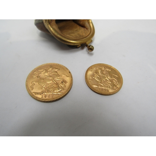 6241 - A 1907 gold sovereign and a 1902 gold half sovereign, in miniature suede coin purse
