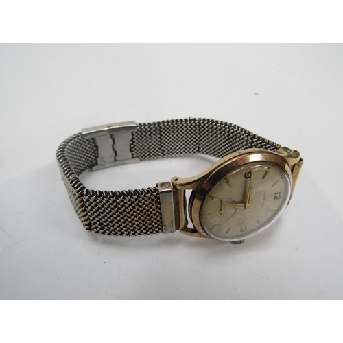 6245 - GARRARDS 1950's gents 9ct gold wristwatch with interesting Havilland propeller hands. Inscription to... 