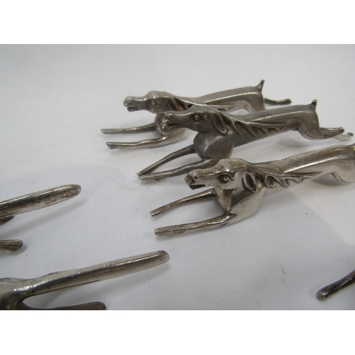 6246 - A set of twelve anamorphic knife rests including pigs, hares, stags and dogs    (C)