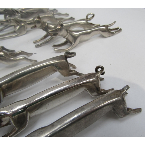 6246 - A set of twelve anamorphic knife rests including pigs, hares, stags and dogs    (C)