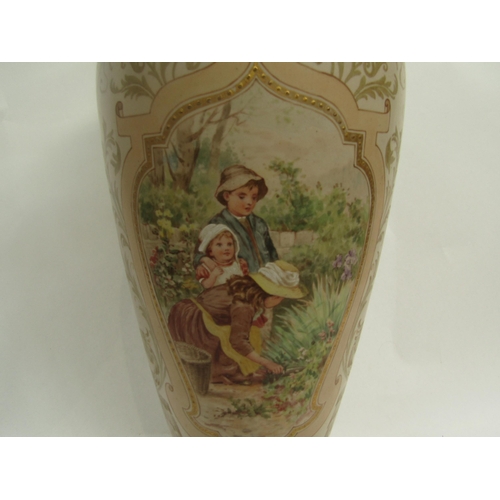 6265 - A Royal Doulton vase decorated by Ada Dennis with panel scenes of children, dragon decoration to pie... 