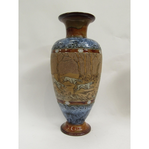 6266 - A Royal Doulton Hannah Barlow vase decorated in scraffito with stag hunting scene. Firing crack to b... 