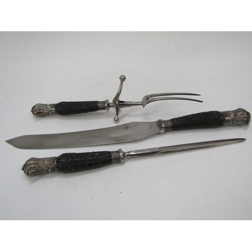 6174 - A cased silver and antler handled carving set by Sterlings and Co silversmiths, Sheffield