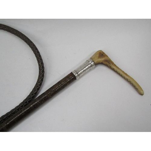 6176 - A vintage carriage whip, leather shaft with silver collar and horn top, knotted leather thong