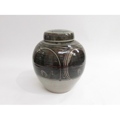 9076 - A Winchcombe Pottery large stoneware lidded jar by Eddie Hopkins (1941-2007) - dark olive glazes wit... 