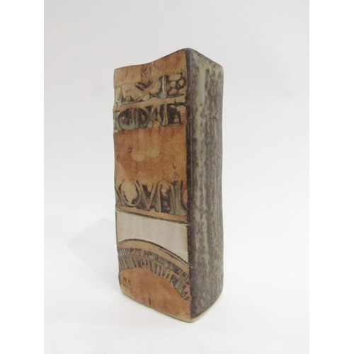 9101 - A Louis Hudson studio pottery slab vase, relief moulded abstract design. Impressed mark, 18cm high