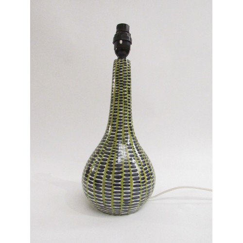 9026 - An Italian Pottery table lamp of bottle form and painted green line and grey dot pattern. Marks insi... 