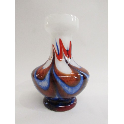 9149 - A Murano Carlo Moretti glass vase with mottled swag detail in blues and red on white ground, 23cm hi... 