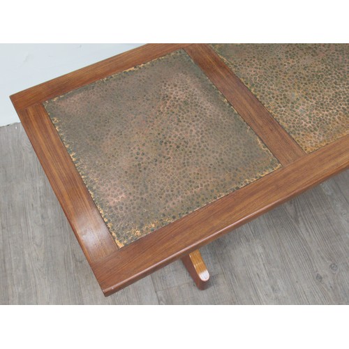 9303 - A G-Plan hardwood coffee table with inset beaten copper panel top, 131.5cm x 52cm x 46cm high      (... 