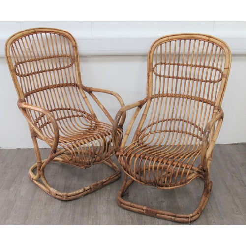 9314 - A pair of 1970's Italian bamboo cantilever chairs by Tito Agnoli for Bonacina. 106cm high