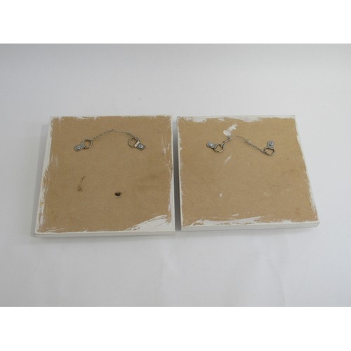 9092 - Two studio ceramic tiles mounted onto board depicting female and male nude figures in textured finis... 