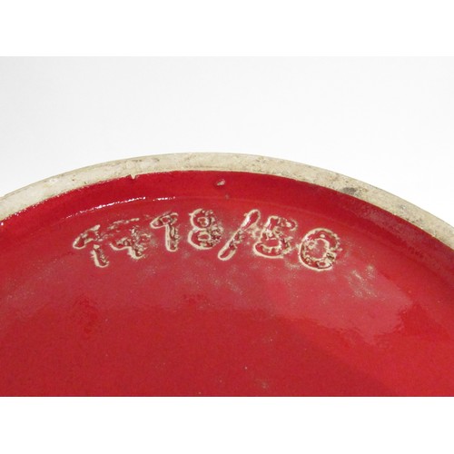 9008 - A West German Fat Lava Pottery vase in red with central relief moulded bands of geometric shapes in ... 