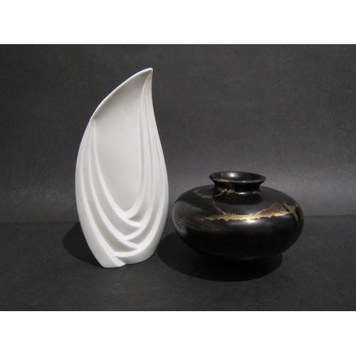 9079 - TONY LAVERICK (b.1961) Two items of pottery including a white glazed vase, 24cm high and black and g... 