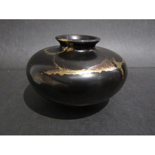 9079 - TONY LAVERICK (b.1961) Two items of pottery including a white glazed vase, 24cm high and black and g... 