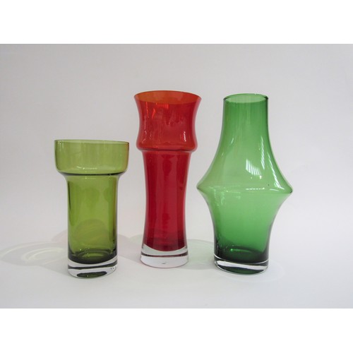 9132 - A Finnish red glass vase by Tamara Aladin, model 1373 and two other vases in green. Tallest 25cm