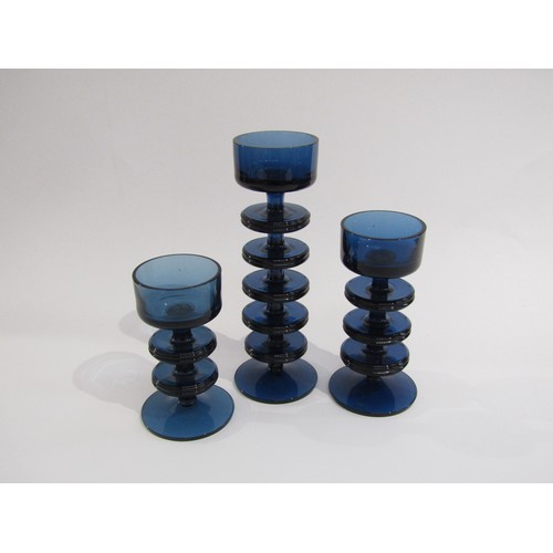 9169 - Three Sheringham candleholders in blue glass 1 x 5 ring, 1 x 3 ring and 1 x 2 ring, designed by Rona... 