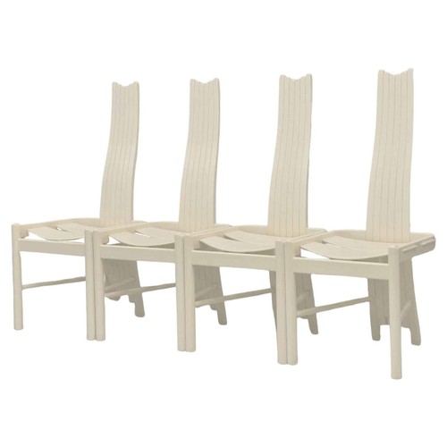 9324 - A postmodern 1980's circular dining table in off white with four sculptural high backed chairs. Tabl... 