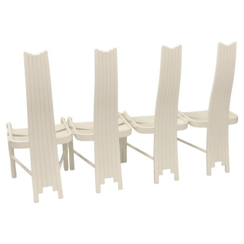 9324 - A postmodern 1980's circular dining table in off white with four sculptural high backed chairs. Tabl... 