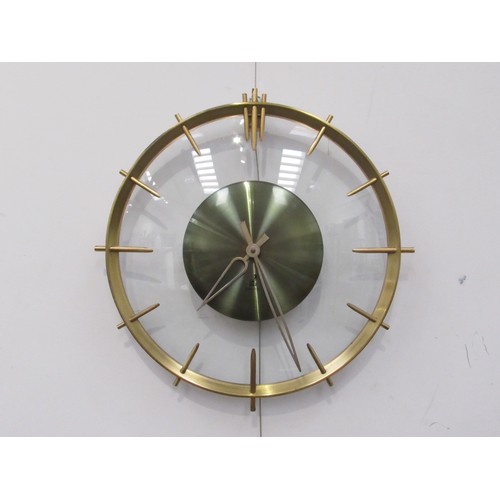 9271 - A 'Jaz' brass and curved glass wall clock,   33cm diameter   (E) £15-30 Antiques