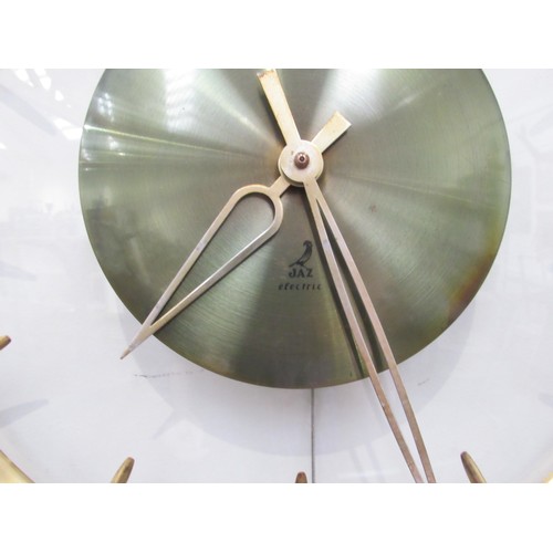 9271 - A 'Jaz' brass and curved glass wall clock,   33cm diameter   (E) £15-30 Antiques