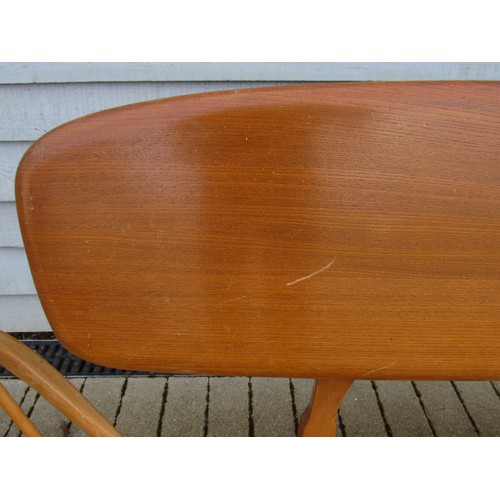 9346 - An Ercol light elm sofa 