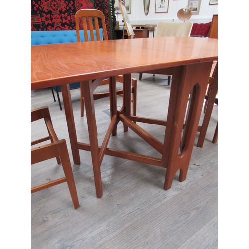 9304 - A Danish teak dining table, folding extensions, gate leg action, designed by Brendt Winge Klepper Mo... 