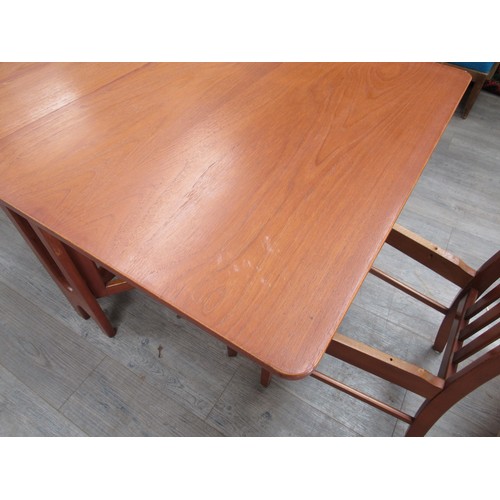 9304 - A Danish teak dining table, folding extensions, gate leg action, designed by Brendt Winge Klepper Mo... 