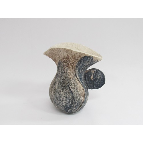 9082 - A Troika style studio pottery jug of abstract form and rough textured body, unmarked. 17cm high