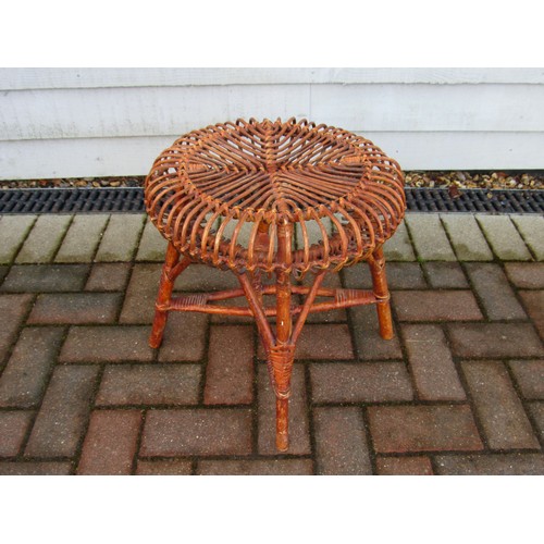 9366 - A cane stool / table by Franco Albini. 42cm high