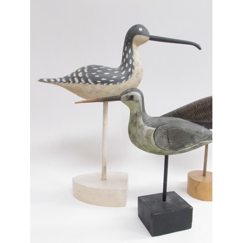 9381 - Three carved hand painted wooden bird sculptures in the style of Guy Taplin. Tallest 43cm