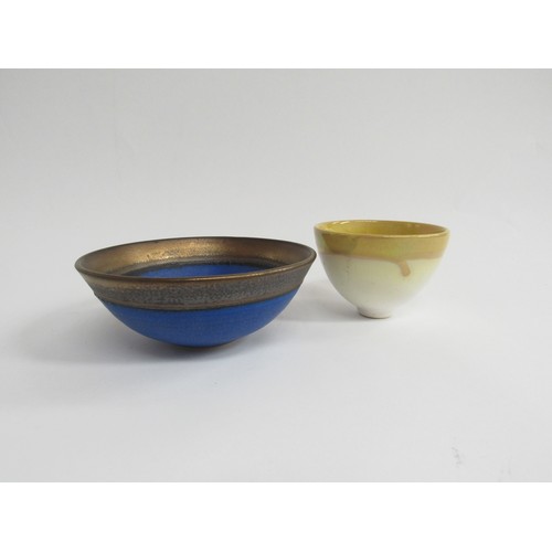 9083 - Two studio pottery bowls, hand painted mark to the base of one, largest 13.5cm x 5.5cm.