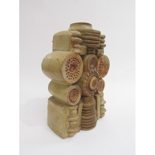 9119 - BERNARD ROOKE (b.1938) A studio pottery large Geometric vase, relief moulded with roundels and colum... 