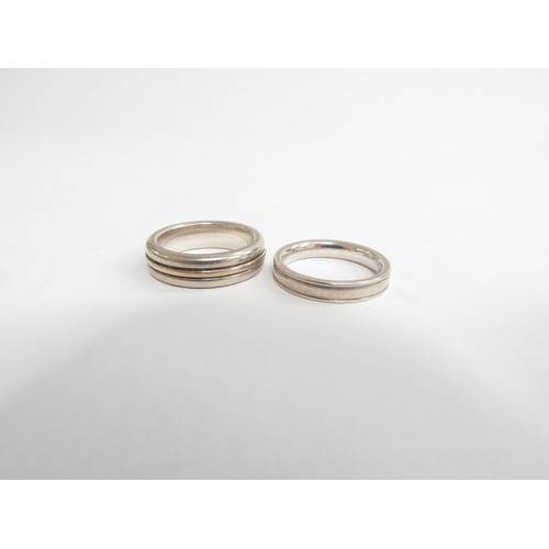 9226 - Two 925 sterling silver contemporary rings in modernist design, both sized around Q/R